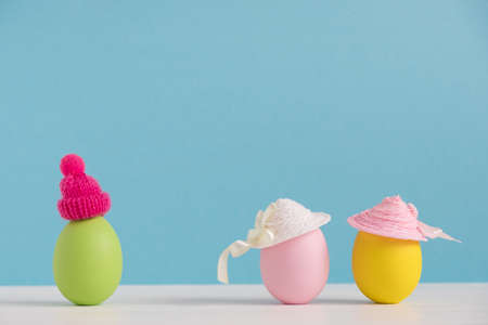Easter holiday concept with cute eggs with funny faces. Different emotions and feelings. Guys want to meet girls.の写真素材