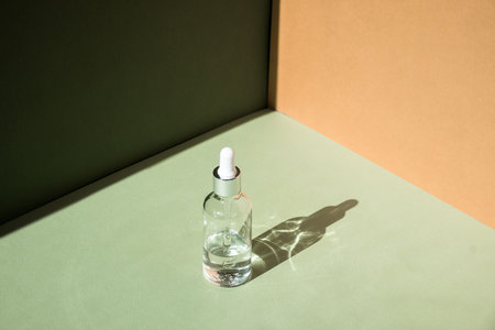 Dropper glass Bottle Mock-Up. Body treatment and spa. Natural beauty products. Eco cream, serum,...