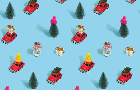 Christmas pattern made with various winter and New Year objects on bright light blue background. Minimal Christmas concept.の写真素材