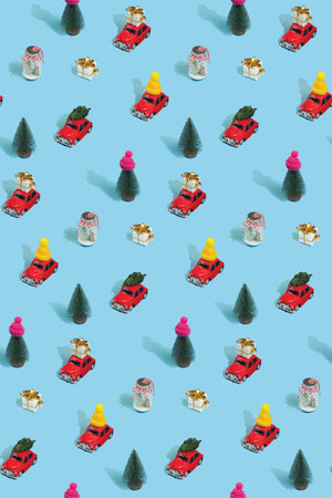 Christmas pattern made with various winter and New Year objects on bright light blue background. Minimal Christmas concept.の写真素材