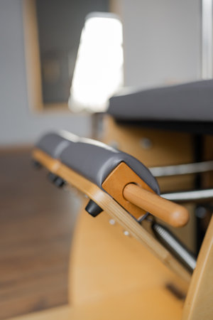 Pilates reformer chair for Pilates gym exercise. Professional equipment for Pilates studio. Details. Correction of musculoskeletal system, beautiful body.の写真素材