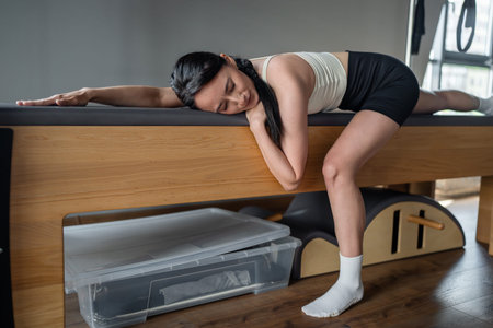 Pilates sessions on reformers effectively enhance flexibility and develop strengthの写真素材