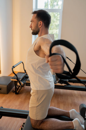 Close up hand man Core body muscles, man doing Pilates exercises to strengthen body and stretch....