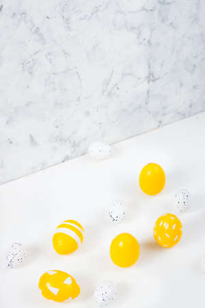 Easter card with colored eggs on a light background. Happy easter concept.Copy space.の写真素材