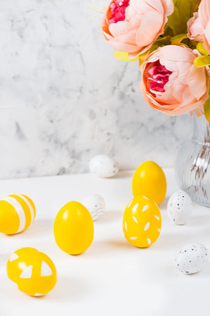 Easter card with colored eggs on a light background. Happy easter concept.Copy space.