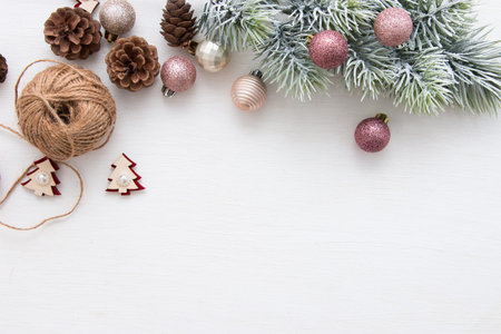 Christmas decorations and gift box on a light background. view from above.