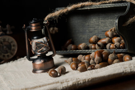 Material of autumn acorn on linen with retro style decorations.