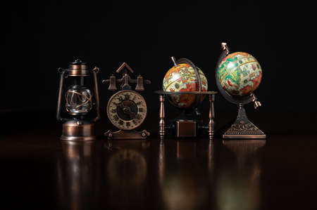 traditional ancient decorations on wood table with black backgroundの写真素材
