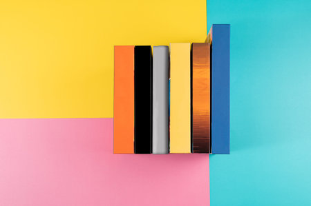 minimalist 6colors(orange,black,gray,yellow,sunset,blue) books on colorful background;