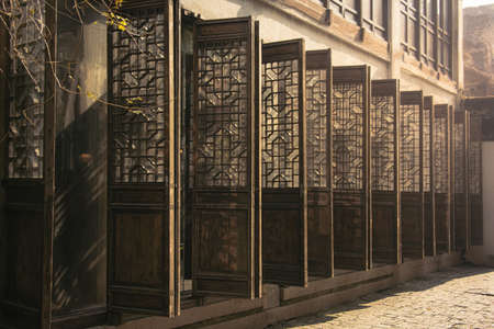 Traditional chinese wooden door at Suzhou,Jiangsu,China in afternoon.のeditorial素材