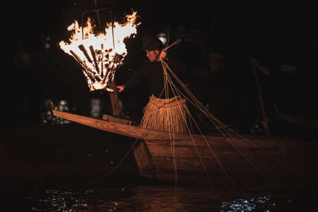 pelican fishing called Ukai in Gifu,Japan is a event more than 1300 years.Fished fish were consecrating to Japanese Emperor.This event start from May to October.のeditorial素材