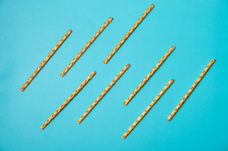 salted wheat stick on blue background with wave style.