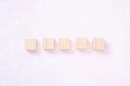 wood block with pink background for design.