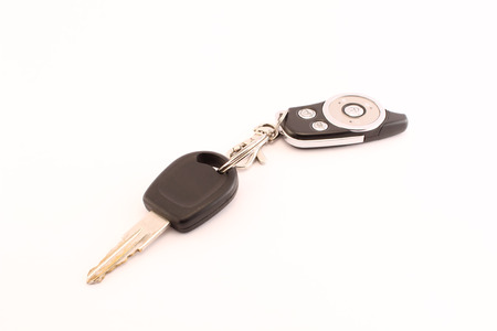 Car key white backround. Close-up car remote control.の写真素材
