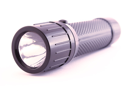 Isolated flashlight. A black lantern on a white background.の写真素材