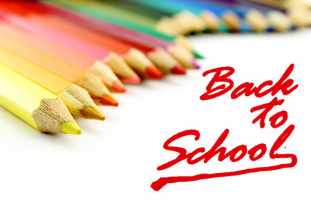 Back to school concept  Composition with colored pencils on white background 