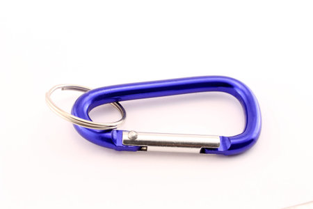 Close-up view of an blue safety hook, isolated on white background.