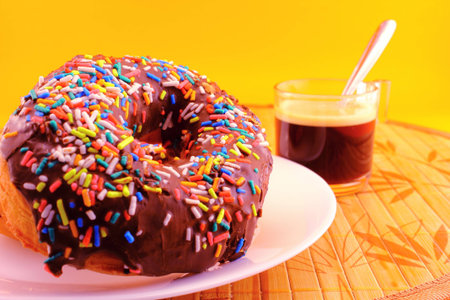 Snack with delicious donuts and coffee cup.の写真素材