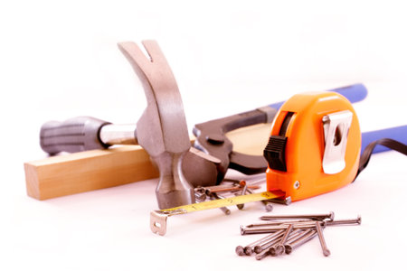 Carpentry tools isolated on white background. Closeup image.