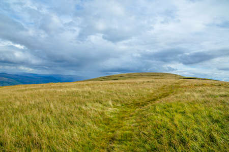 Mountain landscape in the autumn with clouds.の写真素材
