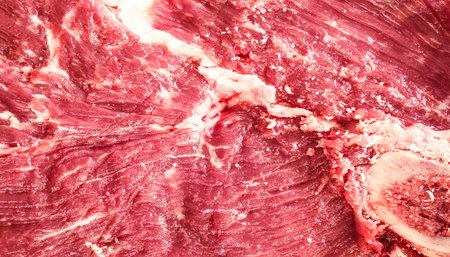 Background texture of freshly minced beef meat.