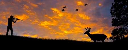 Silhouette of a hunter aiming at a White tail buck against an evening sunset の写真素材