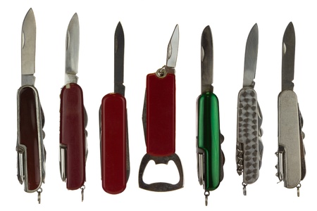 Swiss army knife collage isolated on a white background depicting a variety of all purpose knives.の写真素材