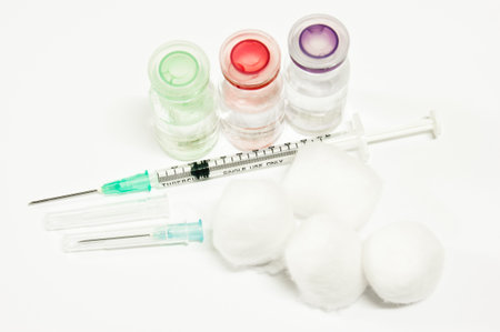 syringe and vaccine use for cure symptom sickの写真素材