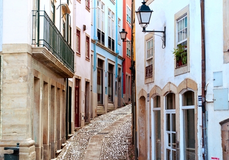 Old and narrow street in Coimbra, Portugalの写真素材