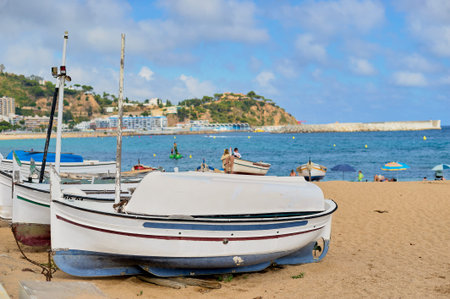 View of Blanes beach with boats in the foreground