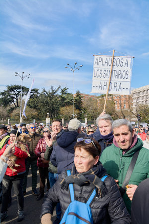 Madrid, Spain - February 12, 2023: Demonstration of citizens and doctors in defense of public health care in the streets of Madridのeditorial素材