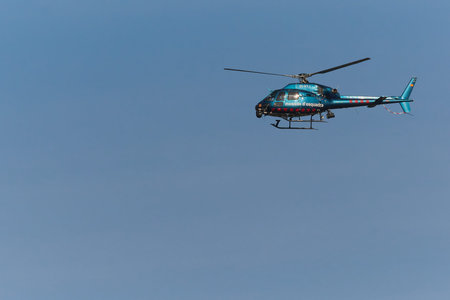 Madrid, Spain - February 23, 2023: Helicopter of the Mossos dEsquadra in flight of the patrol of the...