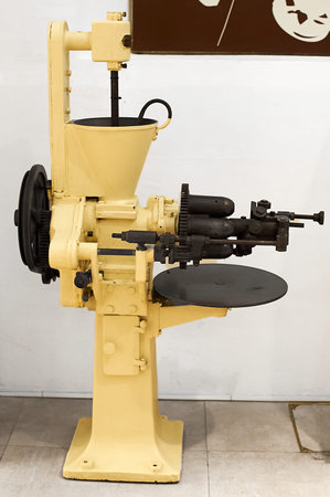 Old machine used in the production of chocolate, exhibited in the xocolata museum in Barcelona.