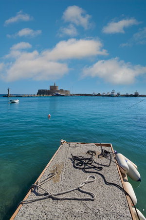 Mandraki Harbour Fort blue waters