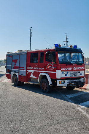 Bari. Italia - March 30, 2026: Professional fire protection truck with GSA branding and blue sirens...