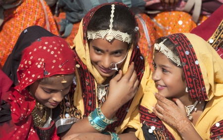 PUSHKAR, INDIA - NOVEMBER 21:  An unidentified girls in colorful ethnic attire attends at the Pushkar fair on November 21, 2012 in Pushkar, Rajasthan, India.のeditorial素材
