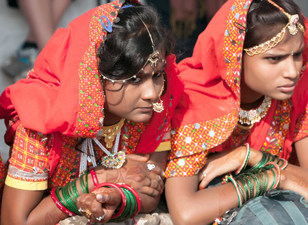 PUSHKAR, INDIA - NOVEMBER 21: An unidentified girls in colorful ethnic attire attends at the Pushkar fair on November 21, 2012 in Pushkar, Rajasthan, India.のeditorial素材