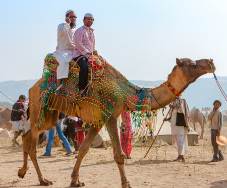 PUSHKAR, INDIA - NOVEMBER 21: An unidentified men attends the Pushkar fair on November 21, 2012 in Pushkar, Rajasthan, India. Farmers and traders from all over Rajasthan flock for the annual fairのeditorial素材