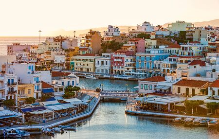 Agios Nikolaos in the early morning, Crete, Greece. Agios Nikolaos is a picturesque town in the eastern part of the island Crete built on the northwest side of the peaceful bay of Mirabelloâ¨の写真素材