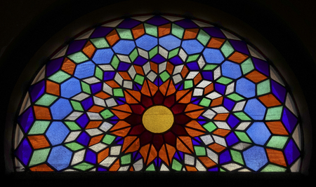 Cordoba, Andalucia, Spain - March 13, 2018:  Interior of Great Mosque of Cordoba and the Mezquita, Cathedral of Our Lady of the Assumption in Historic centre of Cordoba. Stained-glass windowのeditorial素材