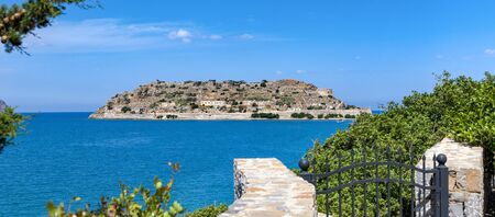 View of the fortress of Spinalonga, Mediterranean Sea, Mirabello Bay, Crete, Greece.の写真素材