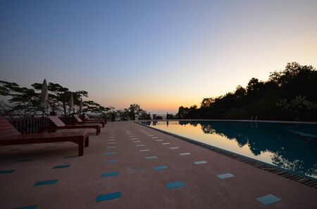 sunrise swimming pool の写真素材