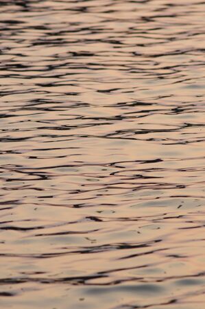 sunset preset water serface waveの写真素材