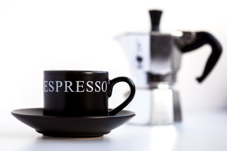 Espresso cup with moka pot on a white backgroundの写真素材