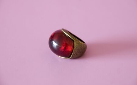 close up of an old  ring on a pink backgroundの写真素材
