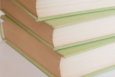 pile of green hardcover  books の写真素材