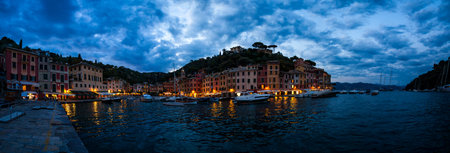 Dramatic cloudy sky over the city of Portofino, Liguria, Italyの写真素材