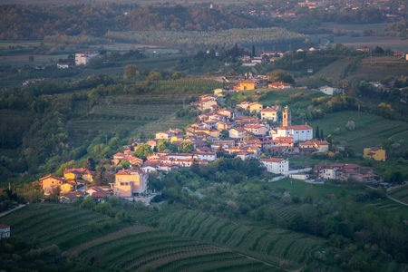 Small village Kozana on sunrise between the vineyards in the wine region Brda in Slovenia near border to Italy in Europeの写真素材