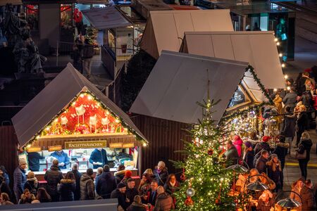 View from city hall Rathaus to small huts on Christmas market Christkindlmarkt on main square in Graz, Styria, Austriaのeditorial素材