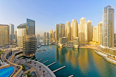 View of Dubai marina district. Dubai Marina is an artificial canal city built along a two mile 3 km stretch of Persian Gulf shoreline.  This district is in the heart of what has become known as "new Dubai" in Dubai United Arab Emirates.のeditorial素材